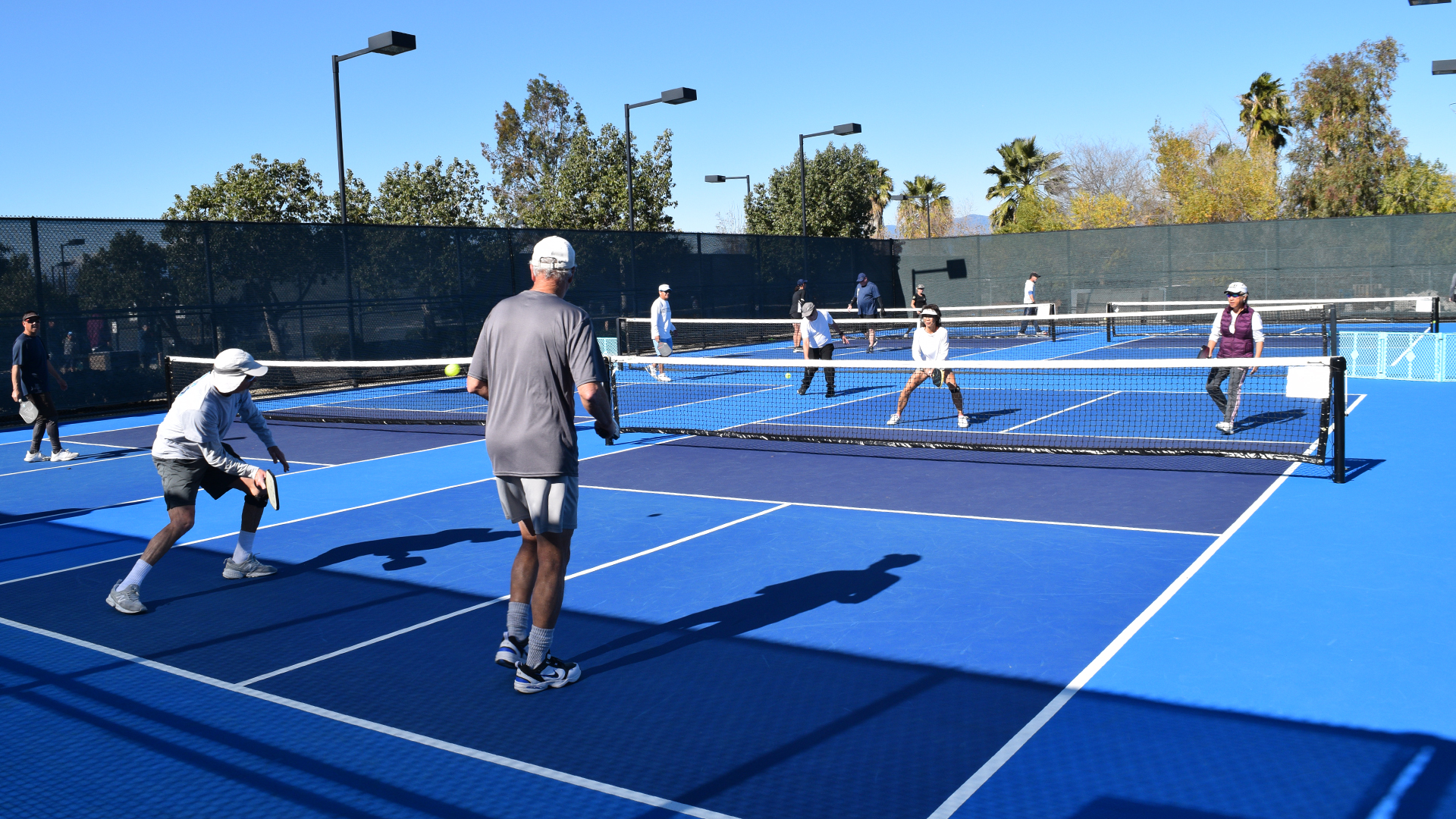 Pickleball players in a match