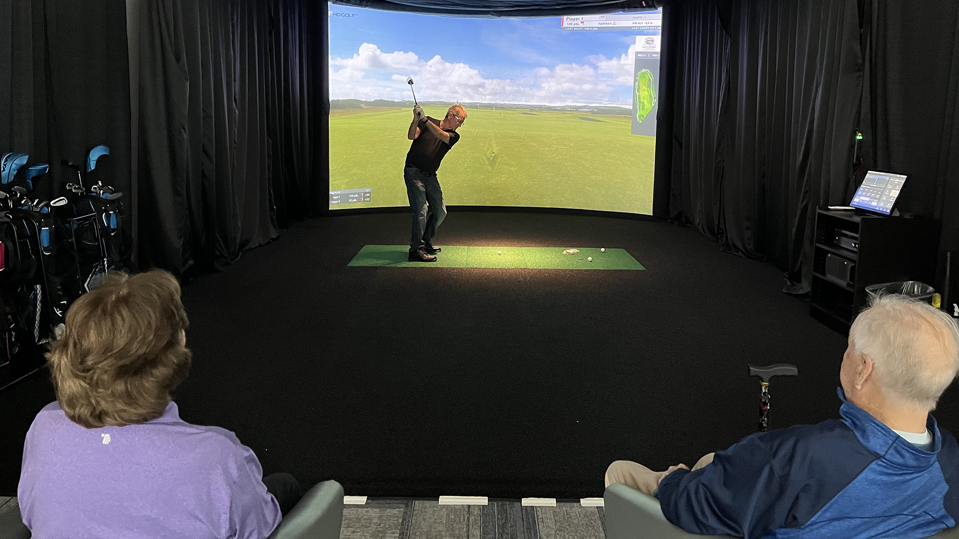 Four golfers tee off at Drayson's Sports Simulator