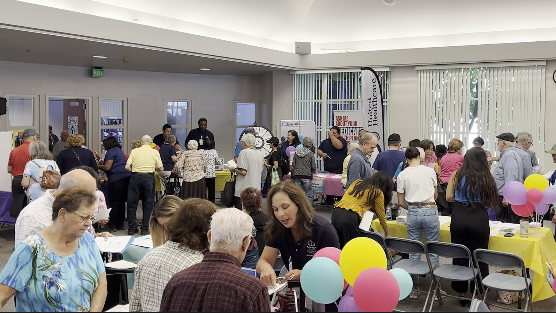 Exhibitors mingle with seniors