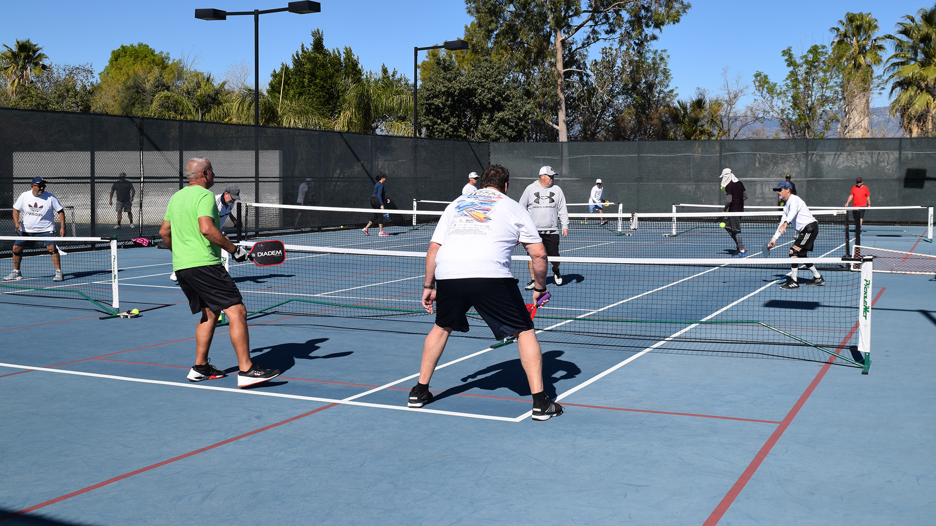 Pickleball players compete.