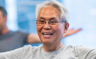 man performing stretching exercise