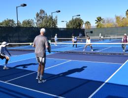 Pickleball players in a match