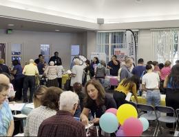 Exhibitors mingle with seniors