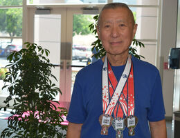 James Ho and his three medals